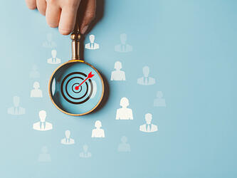 Magnifying glass over a target